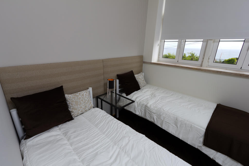Turismo Do Seculo Hotel เอสตอริล ห้อง รูปภาพ A bedroom